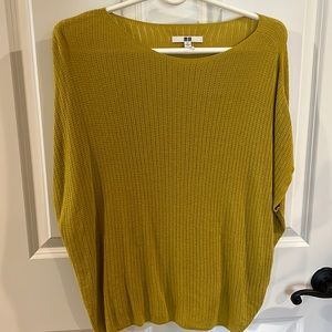 Mustard blouse . Light but not see-through.
